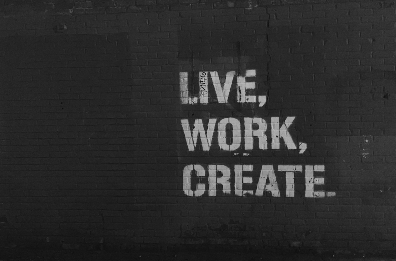 Inscription "Live, Work, Create" on the wall